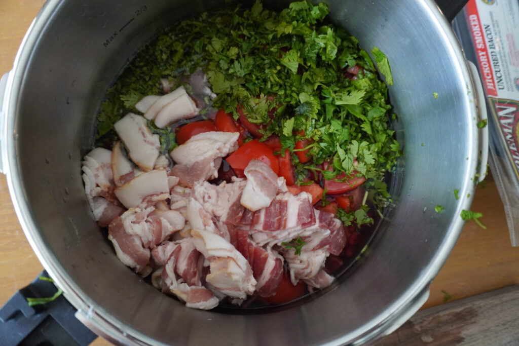 ingredients for colombian red beans in a pressure cooker