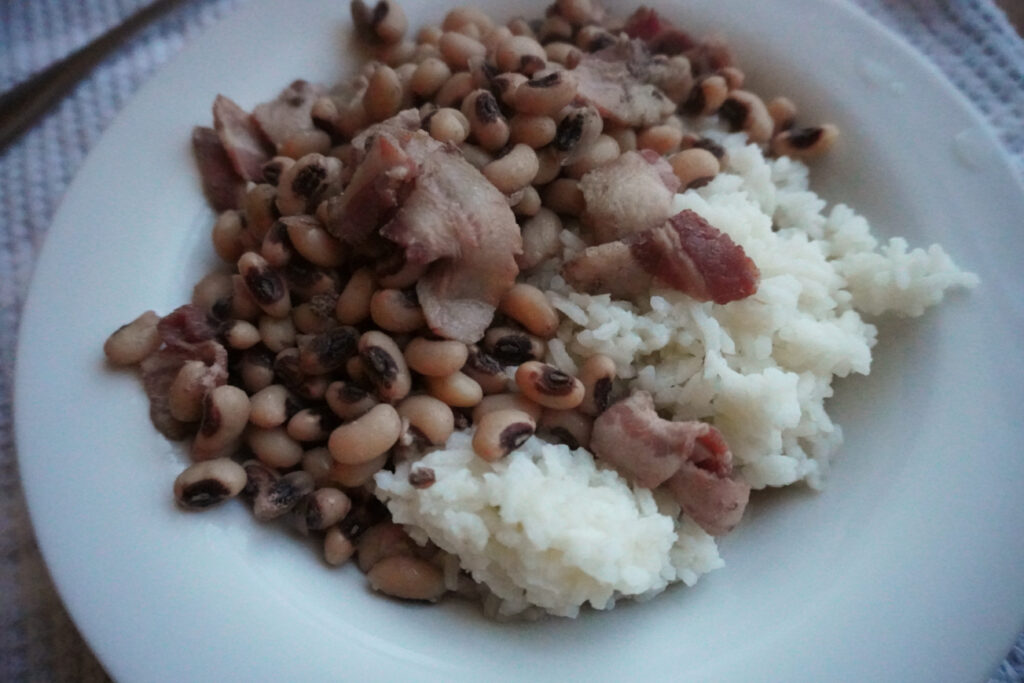 Cooked black eyed peas with rice on a plate