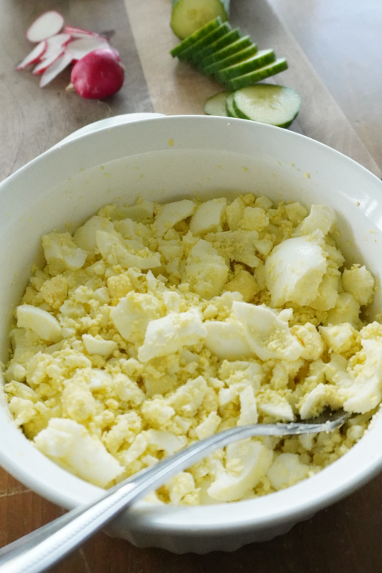 a bowl of mashed hardboiled eggs
