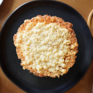 buttery oatmeal stacked on a plate