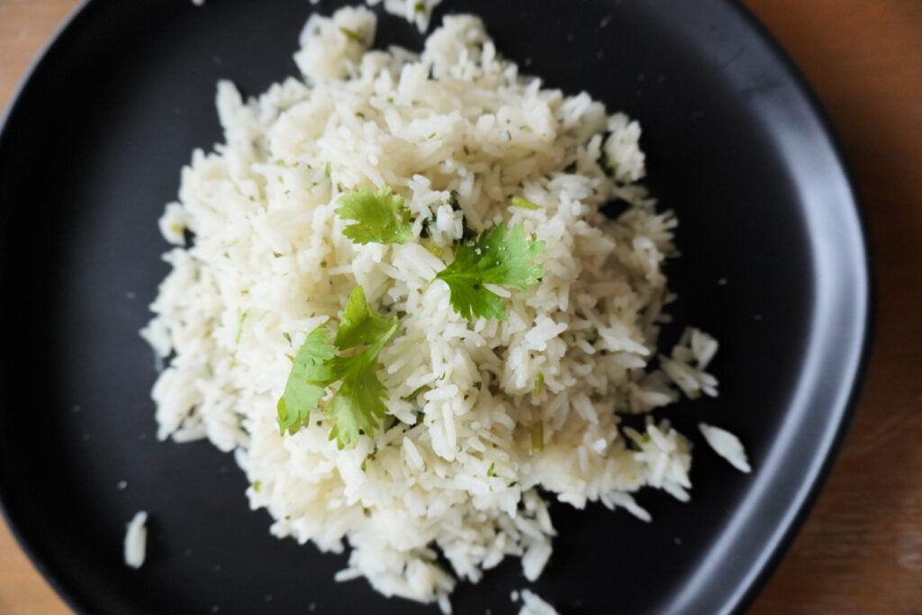 black plate of cilantro lime rice
