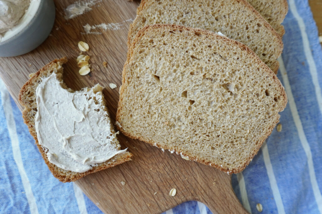 slices of brown bread on a cutting board 