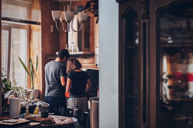 couple cooking together at home